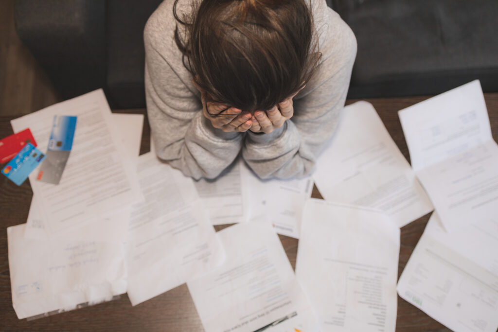 Woman Overwhelmed by Taxes